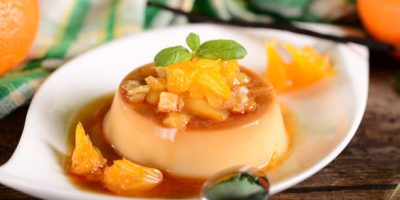 Italian dessert panna cotta with orange sauce